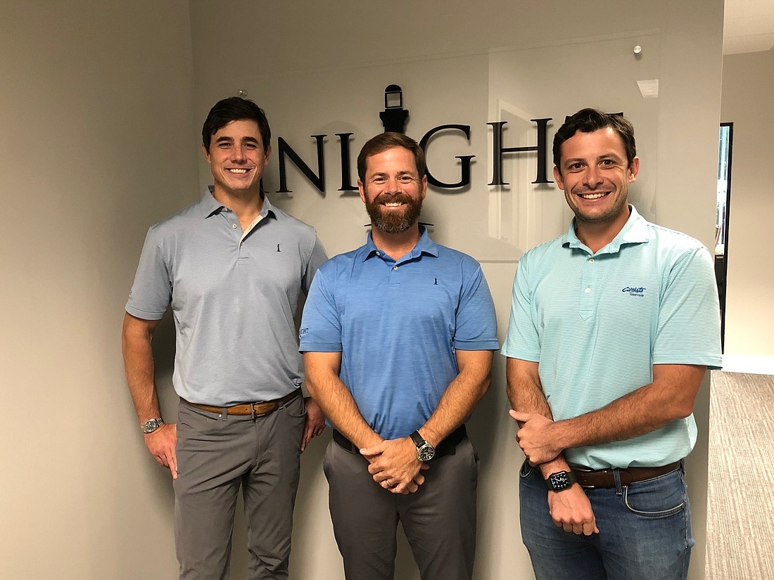 InLight Real Estate Partners Managing Partners David Burch and Jeff Berryhill and Vice President Charles Margiotta at InLightâ€™s Ponte Vedra Beach office.