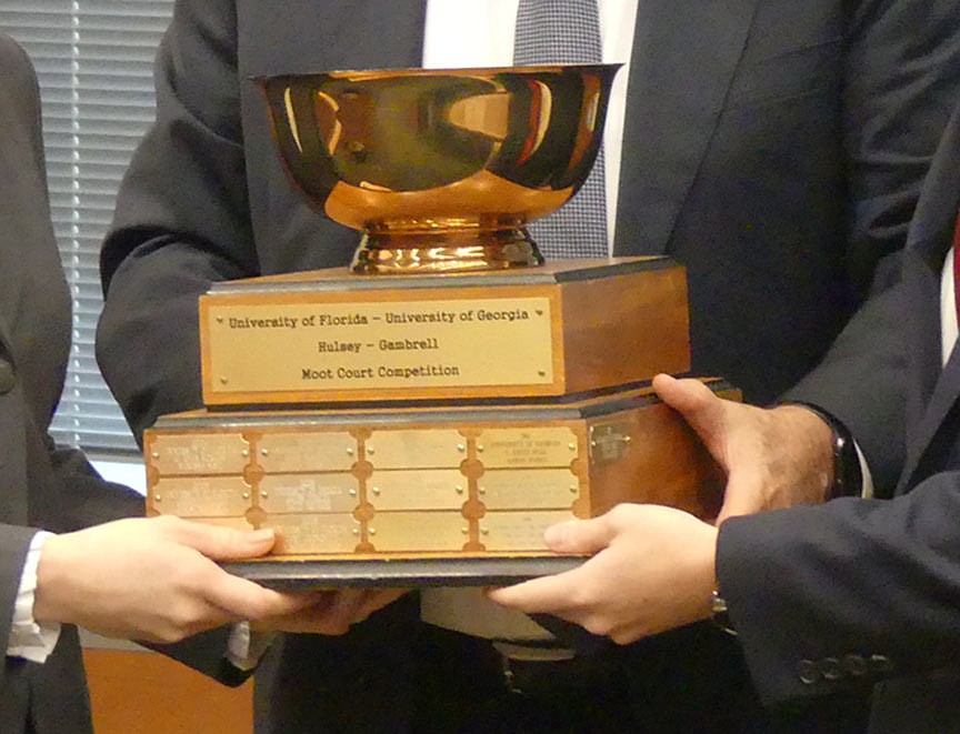 The Hulsey-Gambrell Trophy goes to the winner of the Florida-Georgia Hulsey-Gambrell Moot Court Competition.