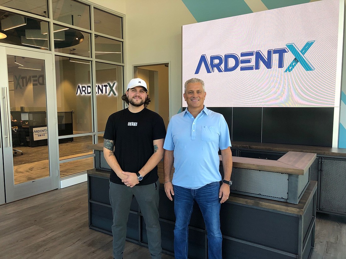 ArdentX COO Connor Miller and his father, company founder and CEO Chuck Miller, at the companyâ€™s new offices and warehouse in Freebird Commerce Center near Jacksonville International Airport.