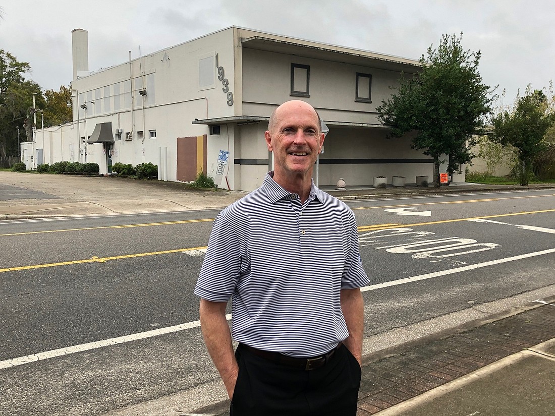 Bill Ware stands in front of the 1939 Hendricks Ave. building that will be renovated for the headquarters of Group 4 Design Inc.