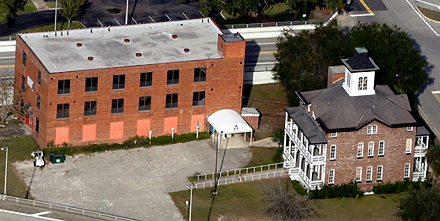 Preston Haskell pledged $400,000 to restore the Casket Factory, left, adjacent to historic St. Lukeâ€™s Hospital, headquarters of the Jacksonville Historical Society.