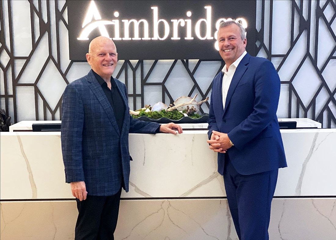 Steve Van, president and CEO of Prism Hotels & Resorts, left, and Aimbridge Hospitality President and CEO Michael Deitemeyer.