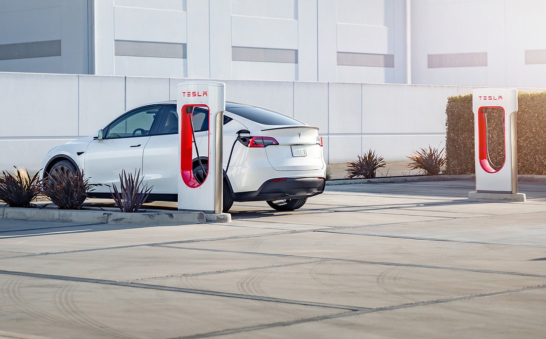 Plans for the electric vehicle showroom include two Supercharger spaces. In the U.S., only Teslas can use Superchargers. (Courtesy of Tesla)