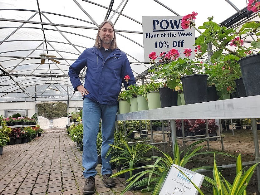 Mike Zaffaroni, owner of Liberty Landscaping Supply, in the greenhouse at the companyâ€™s location on San Jose Boulevard in Jacksonville.