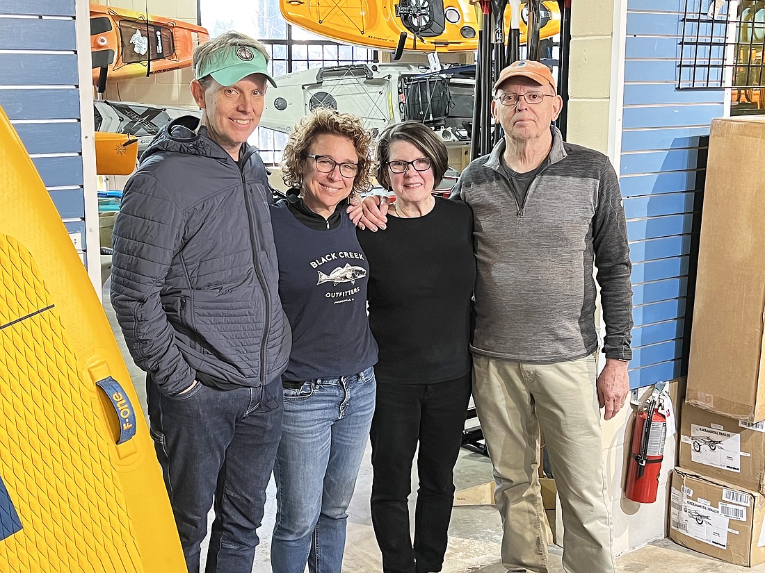 The Butler family has been selling outdoor gear at Black Creek Outfitters near Town Center for 25 years.  Pictured are Joe Butler Jr., Liz Butler, Helen Butler and Joe Butler Sr.
