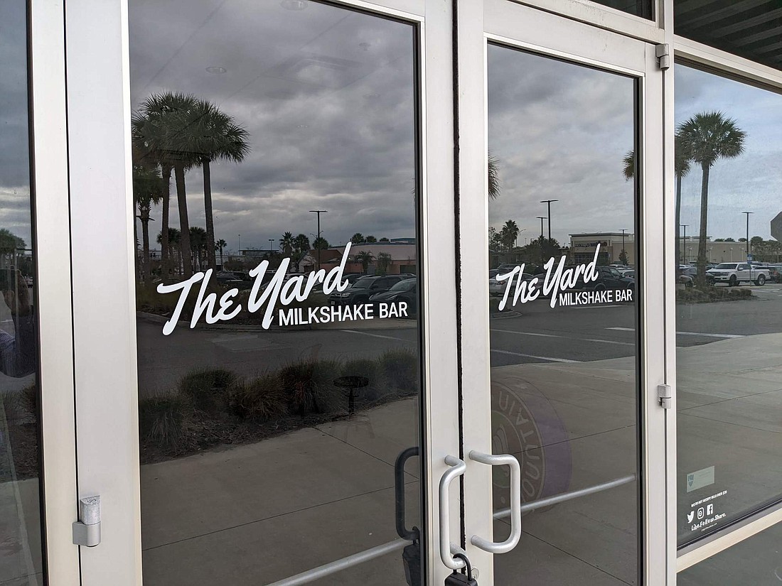 The sign is on the door at The Yard Milkshake Bar planned for The Strand at St. Johns Town Center.