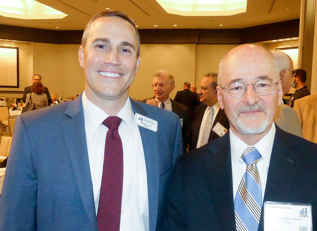 Jacksonville Bar Association President Michael Fox Orr, left, and state Supreme Court Chief Justice Charles Canady, the keynote speaker at the JBAâ€™s member meeting Feb. 16 at the Marriott Jacksonville Downtown.