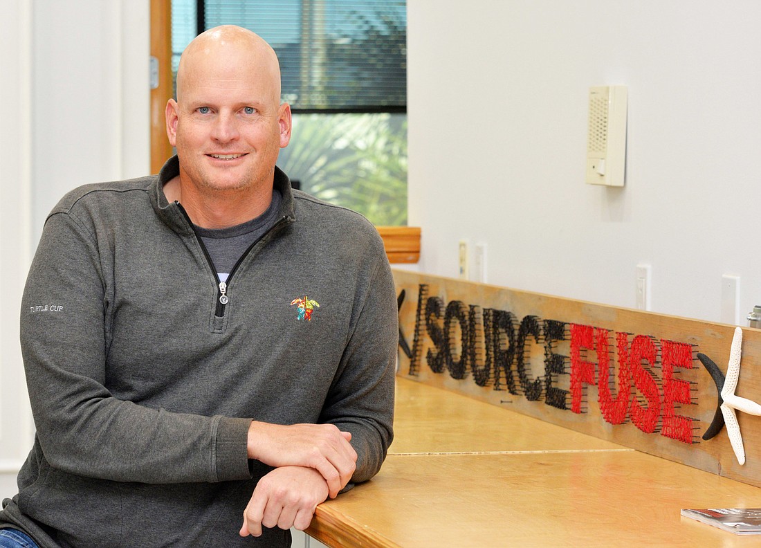 SourceFuse co-CEO Kelly Dyer says the companyâ€™s business model is based on serving clientsâ€™ long-term needs. (Photo by Dede Smith)