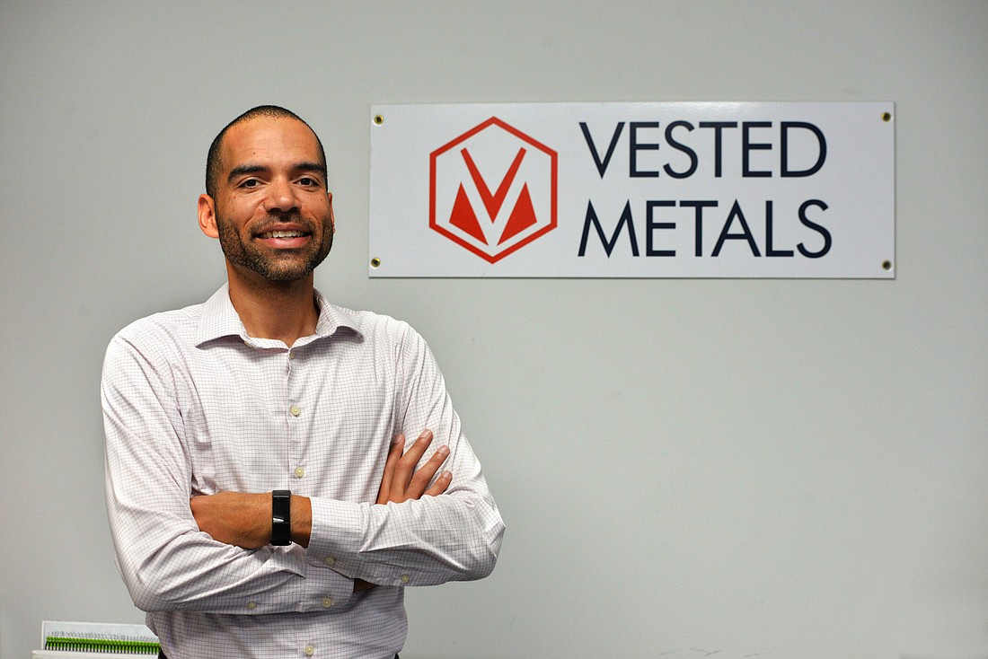 Vested Metals founder and President Viv Helwigâ€™s company cuts metal sheets to its customersâ€™ specifications. â€œOur products have to be 100% right 100% of the time,â€ Helwig said. (Photo by Dede Smith)