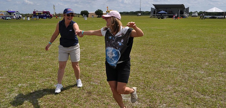 Linda Coble and Sunny Kendrick had fun dancing to BC and the Gang.