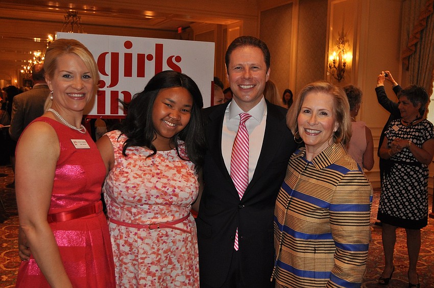 Chairwoman Johanna Gustafsson, Girl of the Year Zandy Sanders, Chairman Chris Pinckney and â€œShe Knows Where Sheâ€™s Goingâ€ honoree Lisa Walsh