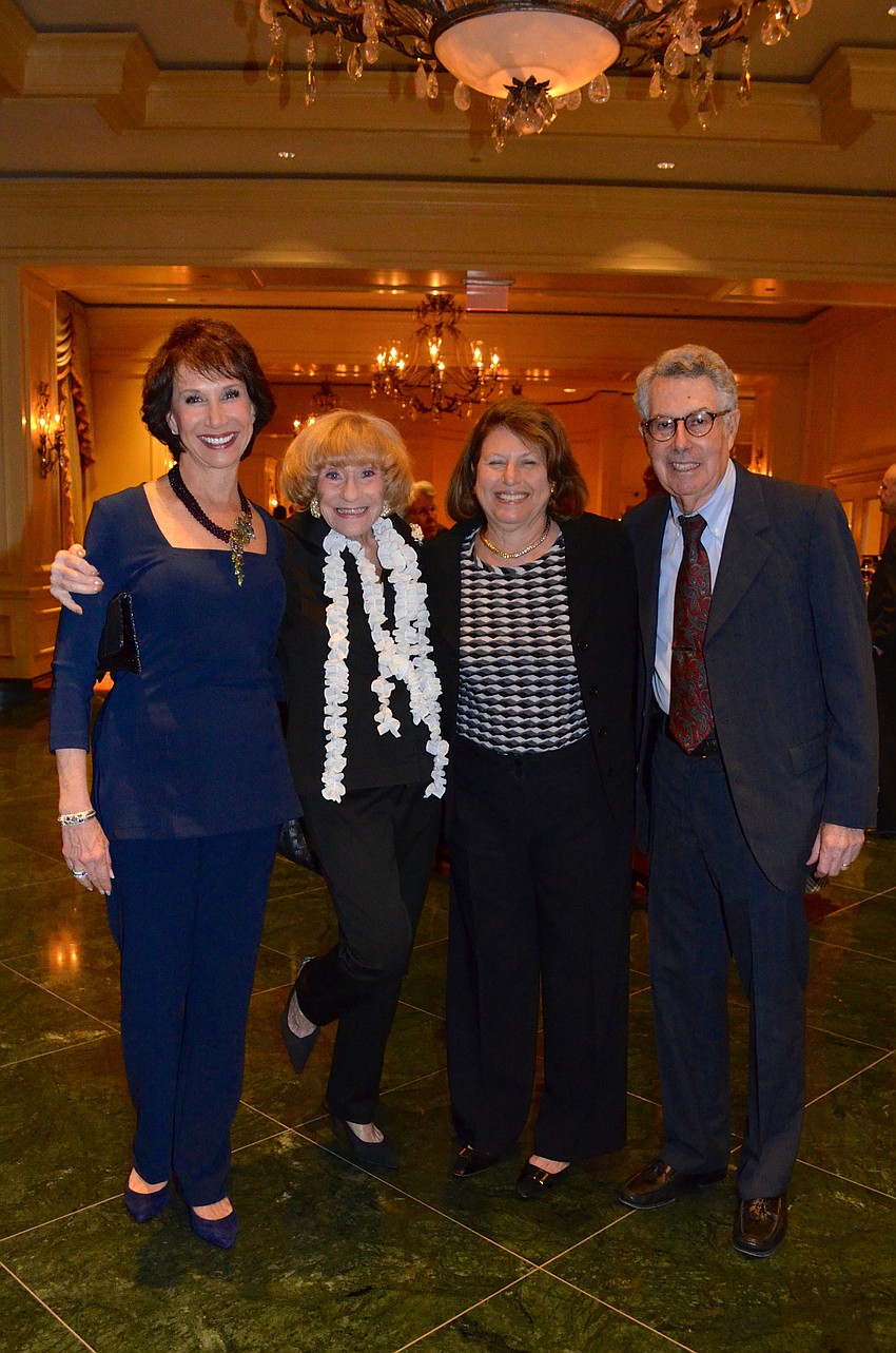 Kathy Levine and Flori Roberts with B.J. and David Bavar