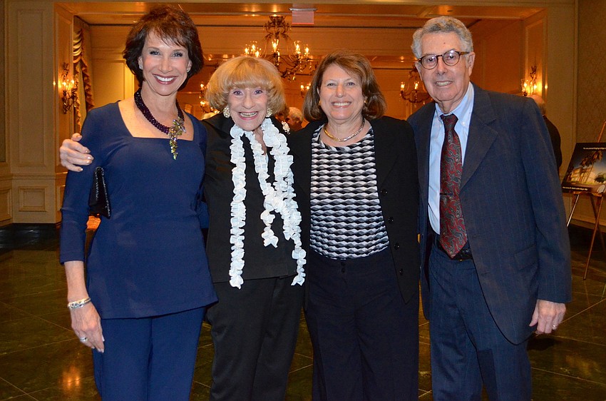Kathy Levine and Flori Roberts with B.J. and David Bavar