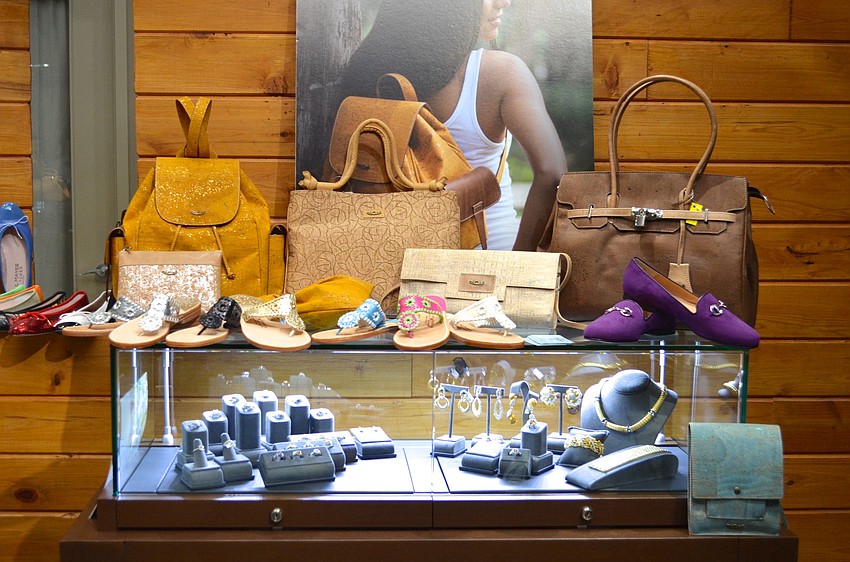 Tatyana Sharoubim of T. Georgianoâ€™s Shoe Salon brought an array of stylish items for the trunk show at Diamond Vault.