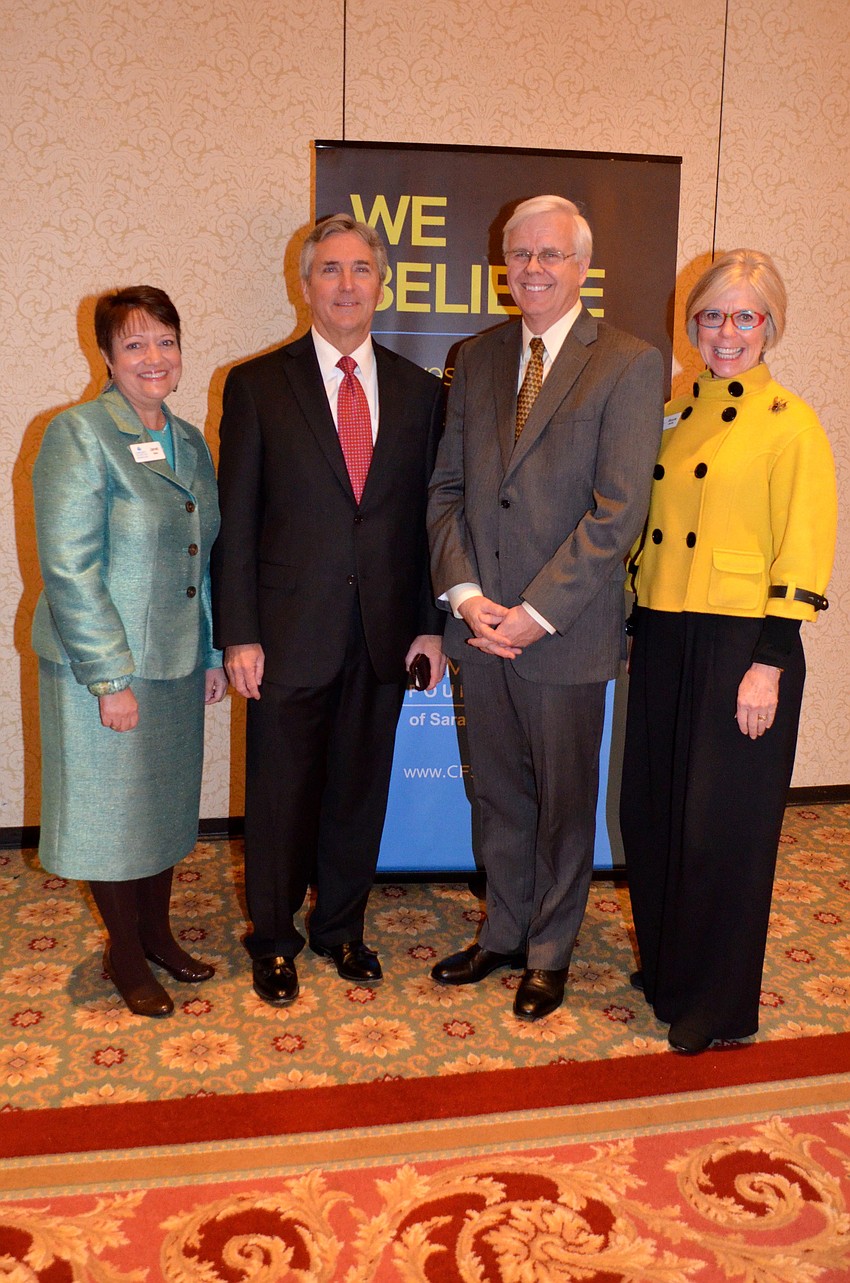 Janet Ginn, Phil Delaney, featured speaker Darrell Ayers and Roxie Jerde
