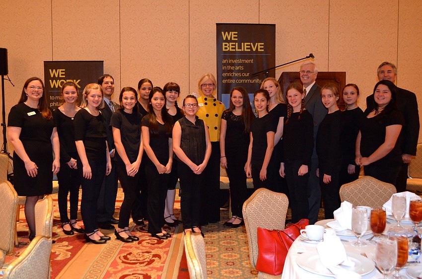 Carrie Mills, Roxie Jerde, featured speaker Darrell Ayers and Phil Delaney with Booker Middle School music theatre students