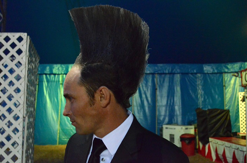 Johnny Rockett shows off his hair.