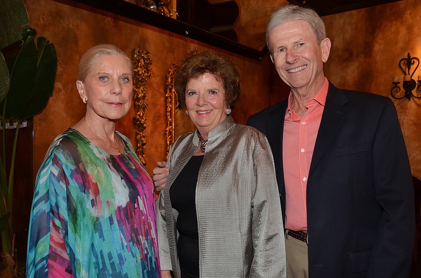 Chairwoman Toni Armstrong with Karen and Steve Nelson
