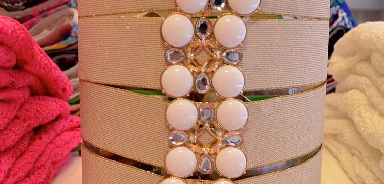 The Emmett belt in gold metallic adds a glamorous touch to any outfit.