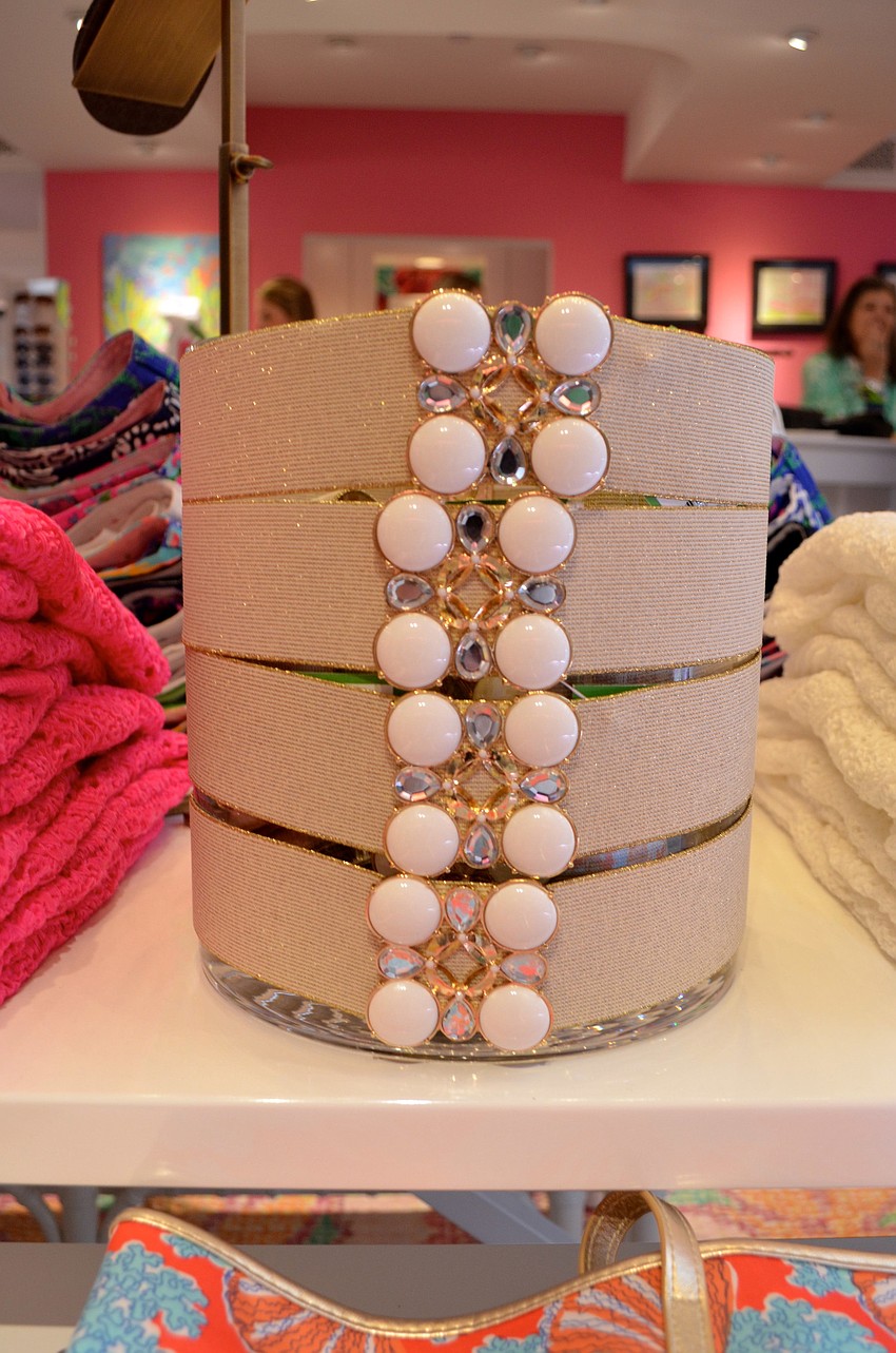 The Emmett belt in gold metallic adds a glamorous touch to any outfit.