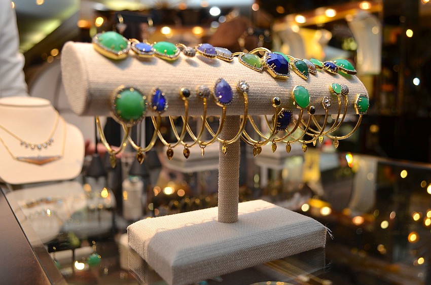 The citrus colors of the Gemma Wynne open bangles in the trunk show were chosen to play off the theme of this yearâ€™s Palm Ball, benefiting The Conservation Foundation of the Gulf Coast.