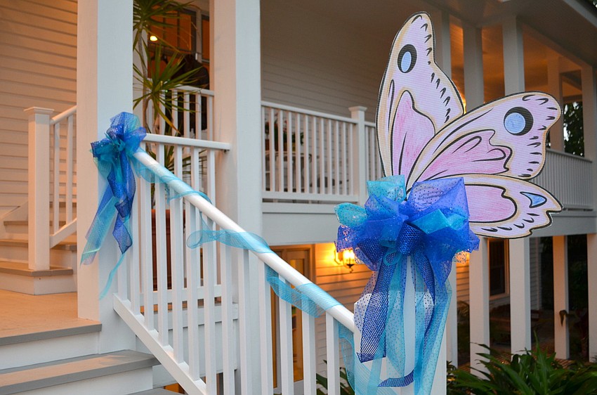 The McGillicuddyâ€™s home was decorated with blue ties and butterflies made by children at the Child Protection Center.
