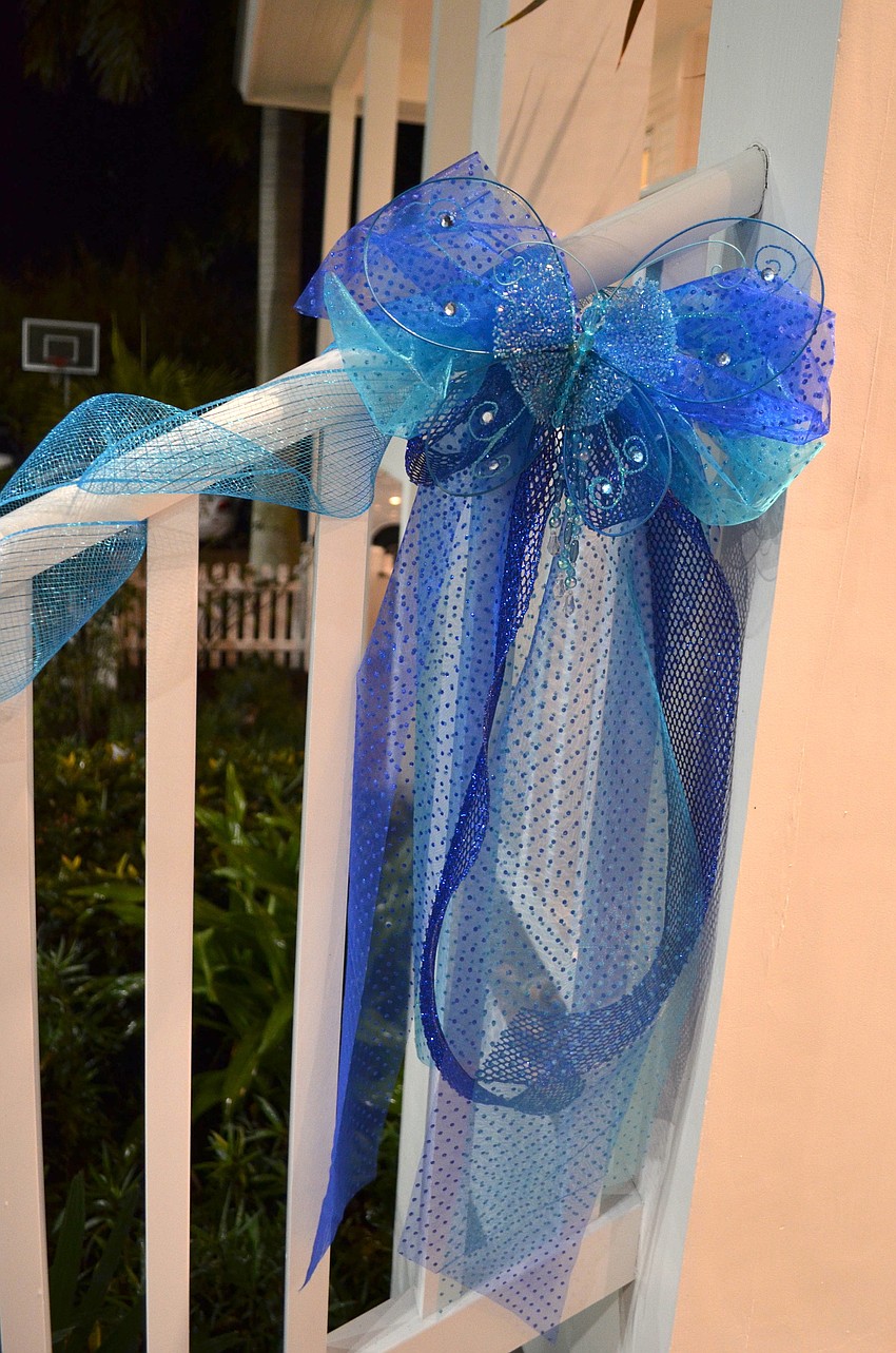 The McGillicuddyâ€™s home was decorated with blue ties and butterflies made by children at the Child Protection Center.
