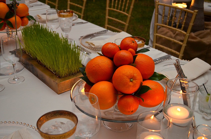 The table centerpieces at The Palm Ball at Bay Preserve â€˜This Land is Your Landâ€™