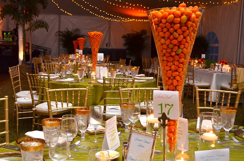 The table centerpieces at The Palm Ball at Bay Preserve â€˜This Land is Your Landâ€™