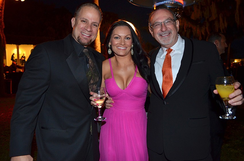 T.J. and Angela Nutter with Ned Davis