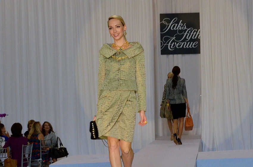 Spring 2014 fashions from Saks Fifth Avenue Sarasota were modeled at the 15th annual Sarasota Womenâ€™s Cancer Awareness Luncheon â€˜ Cure on the Runway.â€™