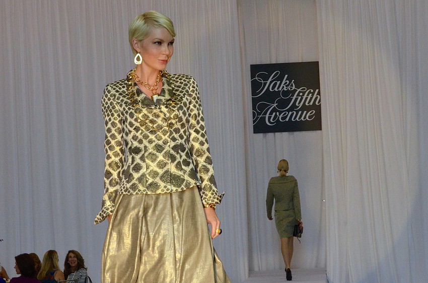 Spring 2014 fashions from Saks Fifth Avenue Sarasota were modeled at the 15th annual Sarasota Womenâ€™s Cancer Awareness Luncheon â€˜ Cure on the Runway.â€™