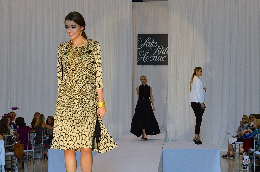 Spring 2014 fashions from Saks Fifth Avenue Sarasota were modeled at the 15th annual Sarasota Womenâ€™s Cancer Awareness Luncheon â€˜ Cure on the Runway.â€™