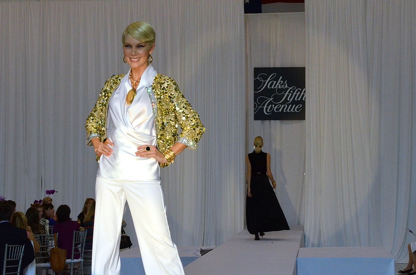 Spring 2014 fashions from Saks Fifth Avenue Sarasota were modeled at the 15th annual Sarasota Womenâ€™s Cancer Awareness Luncheon â€˜ Cure on the Runway.â€™
