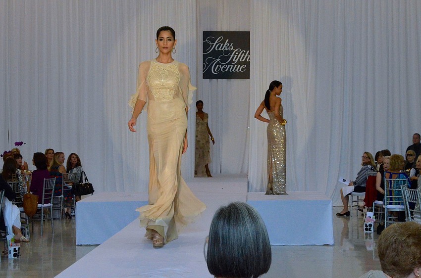 Spring 2014 fashions from Saks Fifth Avenue Sarasota were modeled at the 15th annual Sarasota Womenâ€™s Cancer Awareness Luncheon â€˜ Cure on the Runway.â€™