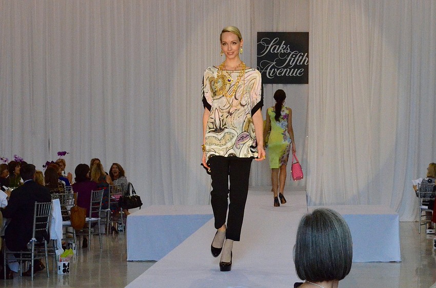 Spring 2014 fashions from Saks Fifth Avenue Sarasota were modeled at the 15th annual Sarasota Womenâ€™s Cancer Awareness Luncheon â€˜ Cure on the Runway.â€™