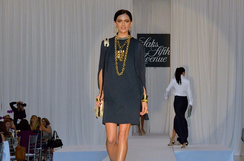 Spring 2014 fashions from Saks Fifth Avenue Sarasota were modeled at the 15th annual Sarasota Womenâ€™s Cancer Awareness Luncheon â€˜ Cure on the Runway.â€™