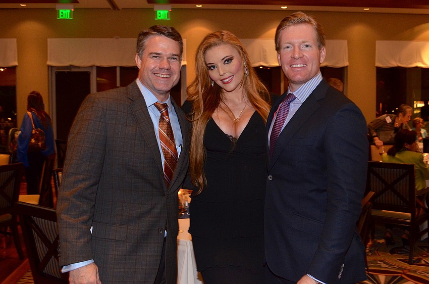 Jason Hughes with Lindsey and Justin Leins