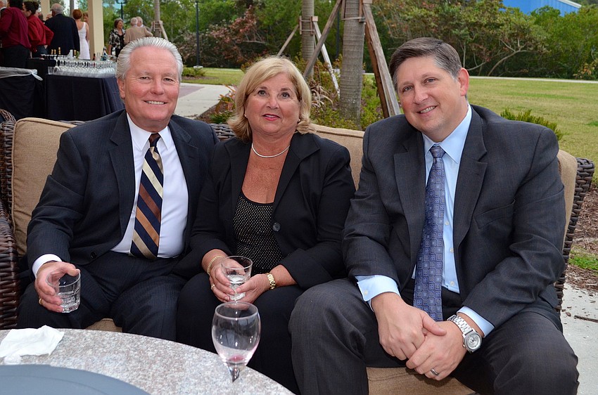 Chuck and Betty Newsom with Dale Wolf