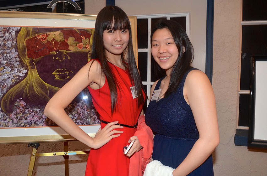 Venice High School student Yuwen Liu and Suncoast Polytechnical High School student Clarissa Choi