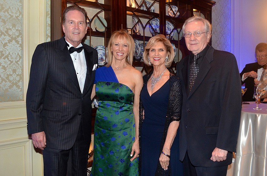 Vern and Sandy Buchanan with Myrna and John Welch