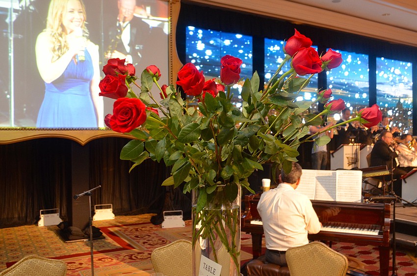 Roses and crystal chandeliers were the elegant centerpieces at Asolo Repertory Theatreâ€™s annual gala â€œA Night at the Rainbow Room.â€