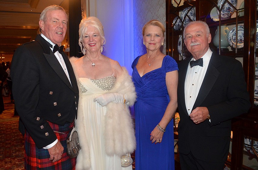 Alasdair and Cheryl MacLauchlan with Glo and Richard Reber