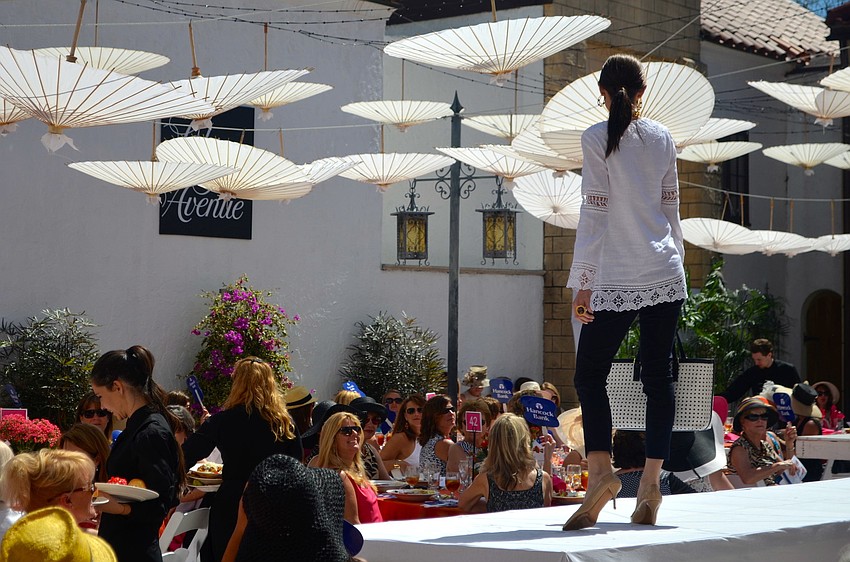 The best of Saks Fifth Avenue Spring 2014 fashions were modeled at Couture in the Courtyard.