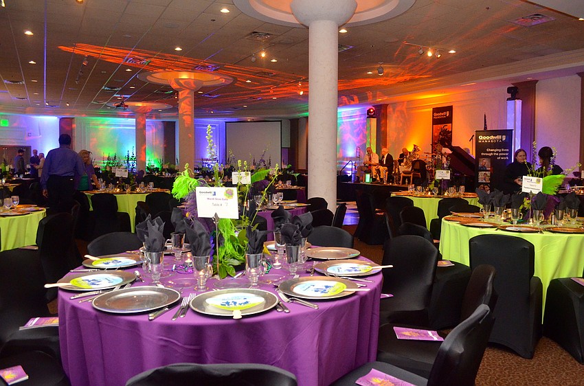 The ballroom at Michaelâ€™s On East was decorated in deep purples and greens for Goodwill Manasotaâ€™s â€˜Countdown to Mardi Gras.â€™
