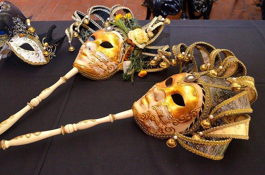 Guests donned masks at Goodwill Manasotaâ€™s â€˜Countdown to Mardi Gras.â€™