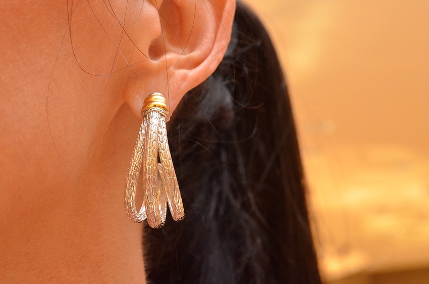 Natalie Nelson models the John Hardy earrings Saks Fifth Avenue Sarasota donated as the auction item for the Seat Selection Soiree.
