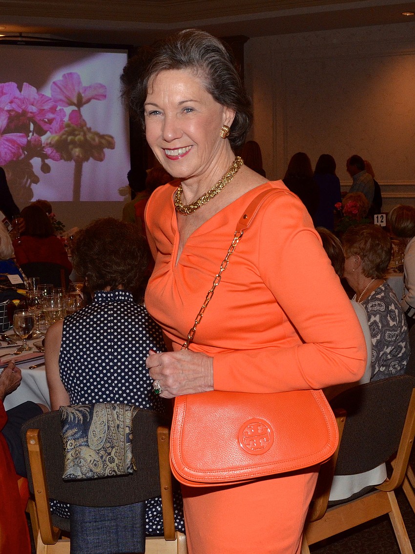 Cornelia Matson dressed fashionably in orange at Junior League of Sarasotaâ€™s 12th annual Legacy Luncheon Wednesday, March 5, at Michaelâ€™s On East.