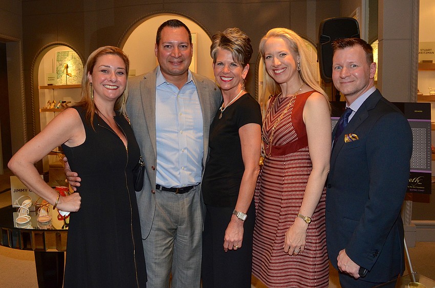 Jessica and Octavio Ortiz, Sally Schule, Chairwoman Ariane Dart and Joel Ellzey