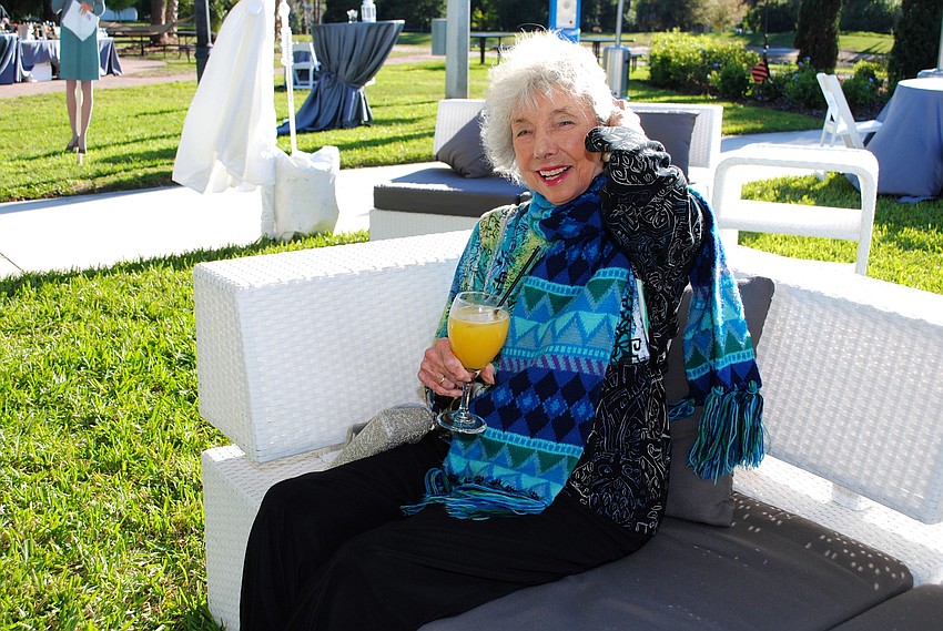 Janet Sheff lounging at Celebrate! 48th annual Planned Parenthood Dinner.